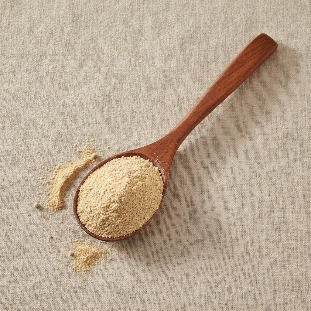 Ashwagandha Root Extract Powder (Withania Somnifera) | Create a luxurious, photorealistic product photograph featuring the original product naturally arranged in an elegant handcrafted wooden spoon on a soft, finely