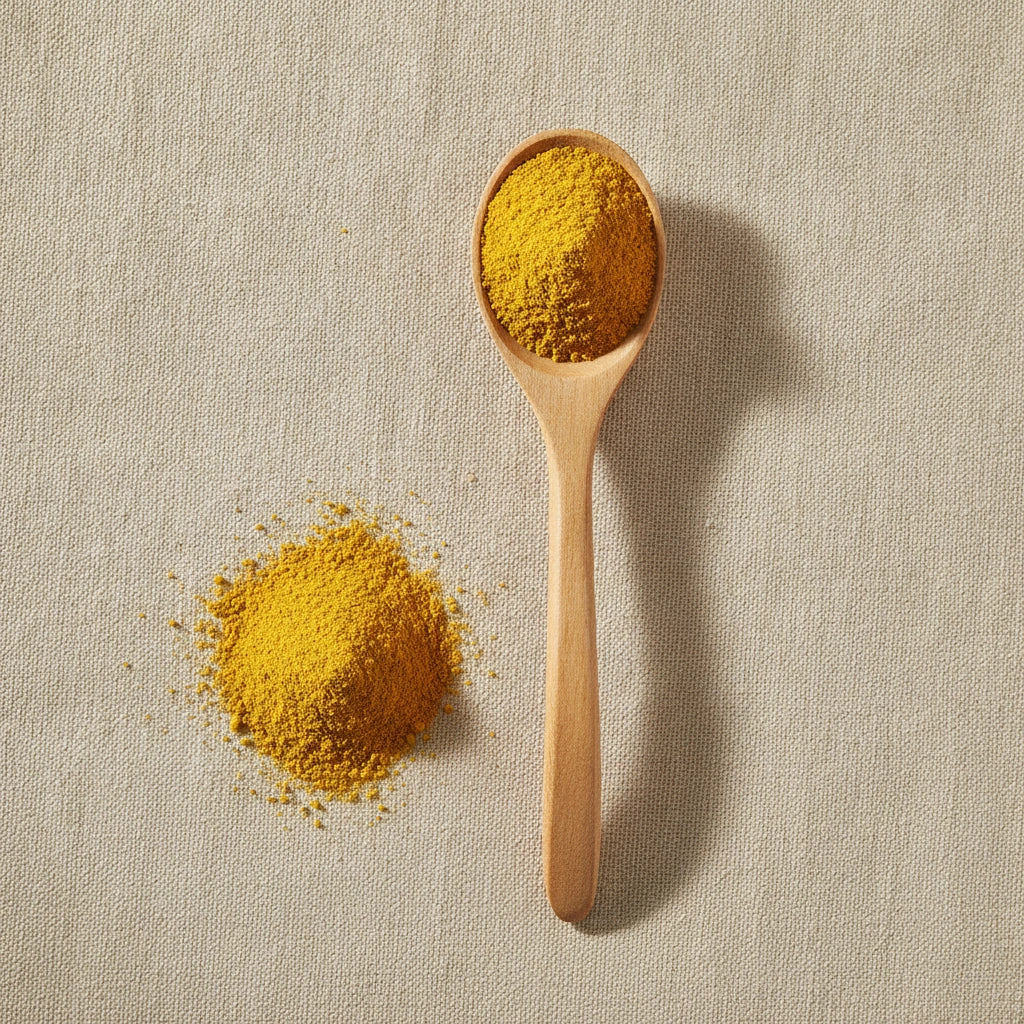 Cattail Pollen Powder (Typha Spp.) | Create a luxurious, photorealistic product photograph featuring the original product naturally arranged in an elegant handcrafted wooden spoon on a soft, finely