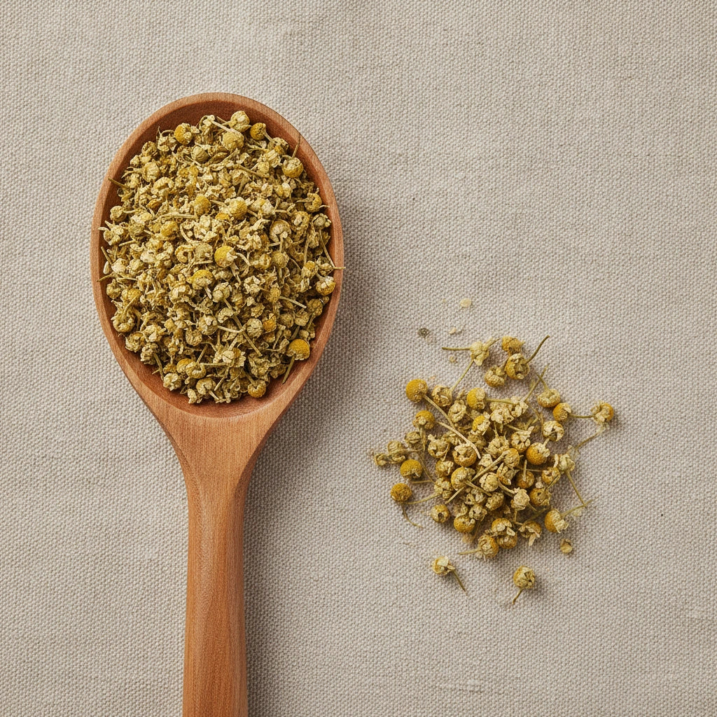 Chamomile Flowers Tea Bag Cut (Matricaria Recutita) | Create a luxurious, photorealistic product photograph featuring the original product naturally arranged in an elegant handcrafted wooden spoon on a soft, finely