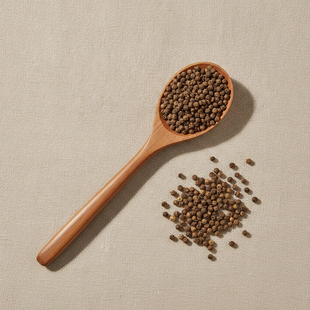 Cleistocalyx Operculatus Flower Bud Whole (Cleistocalyx Operculatus) | Create a luxurious, photorealistic product photograph featuring the original product naturally arranged in an elegant handcrafted wooden spoon on a soft, finely