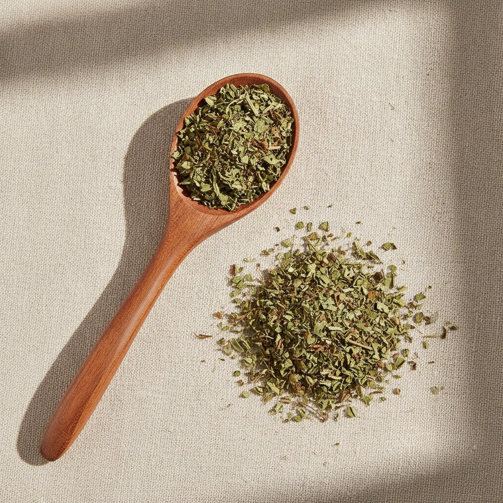 Hawthorn Leaf & Flowers Cut (Crataegus Laevigata) | Create a luxurious, photorealistic product photograph featuring the original product naturally arranged in an elegant handcrafted wooden spoon on a soft, finely