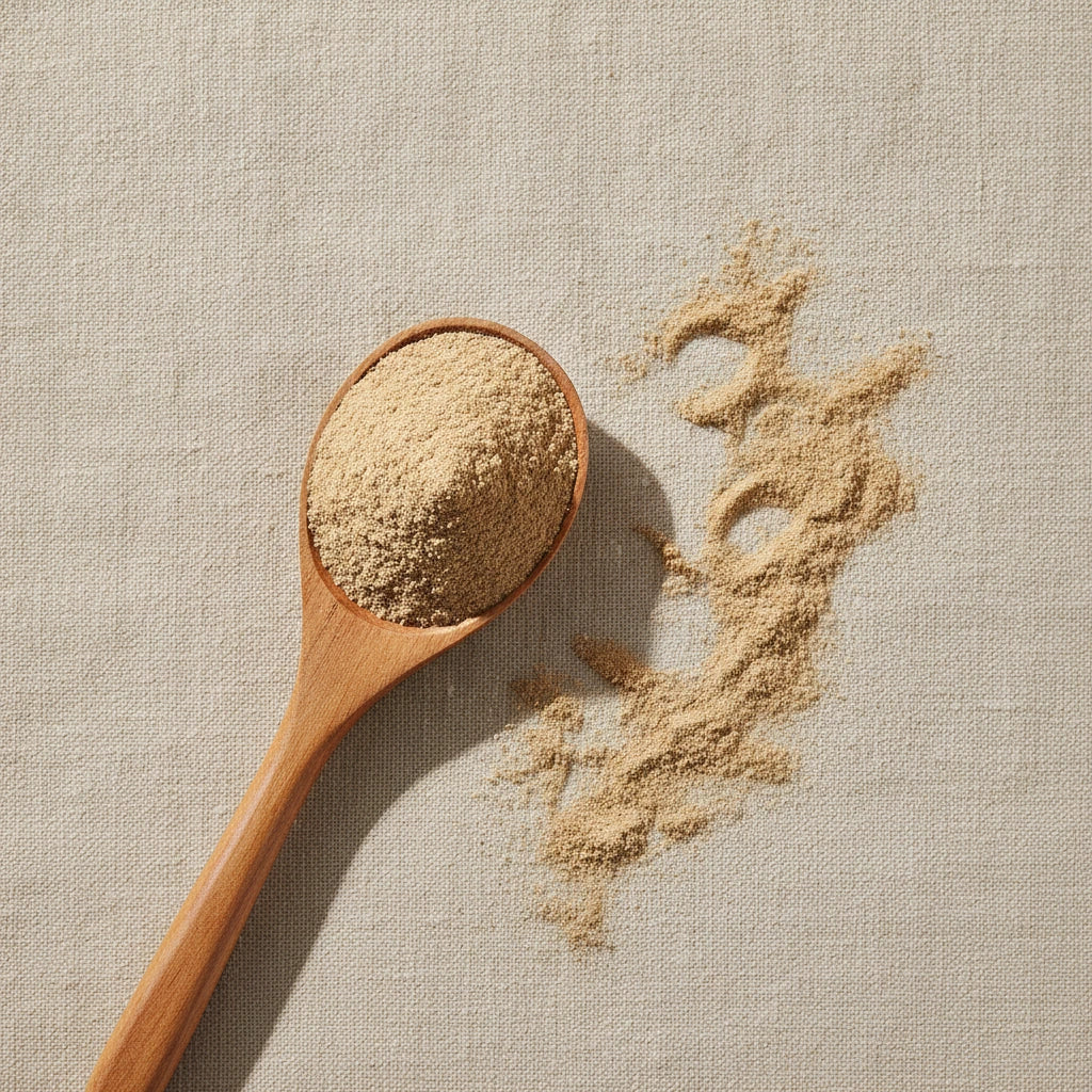 Silkvine Root Bark Powder (Periploca Sepium Bunge) | Create a luxurious, photorealistic product photograph featuring the original product naturally arranged in an elegant handcrafted wooden spoon on a soft, finely