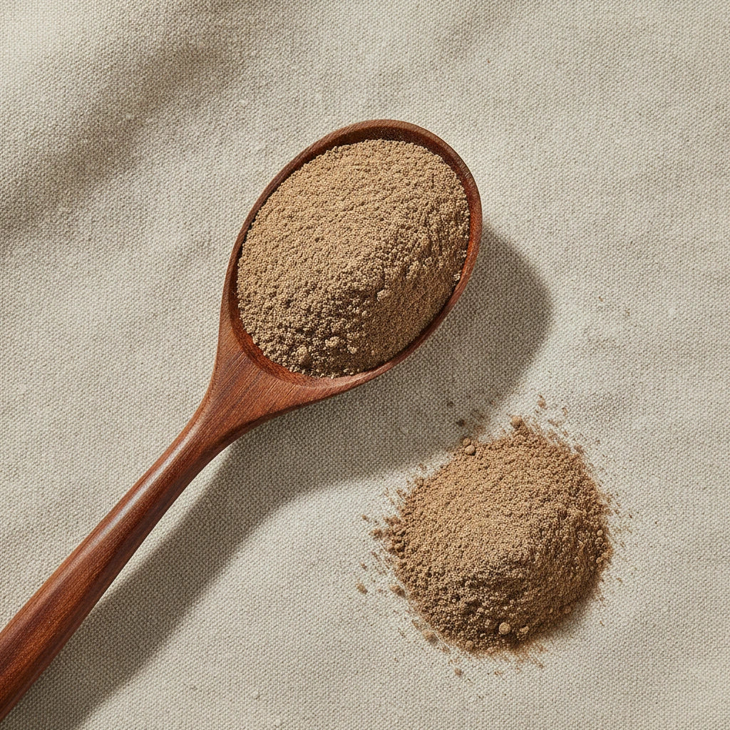 Allspice Powder (Pimenta Dioica) | Create a luxurious, photorealistic product photograph featuring the original product naturally arranged in an elegant handcrafted wooden spoon on a soft, finely