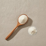 Aloe Vera Extract Powder (Aloe Vera) | Create a luxurious, photorealistic product photograph featuring the original product naturally arranged in an elegant handcrafted wooden spoon on a soft, finely