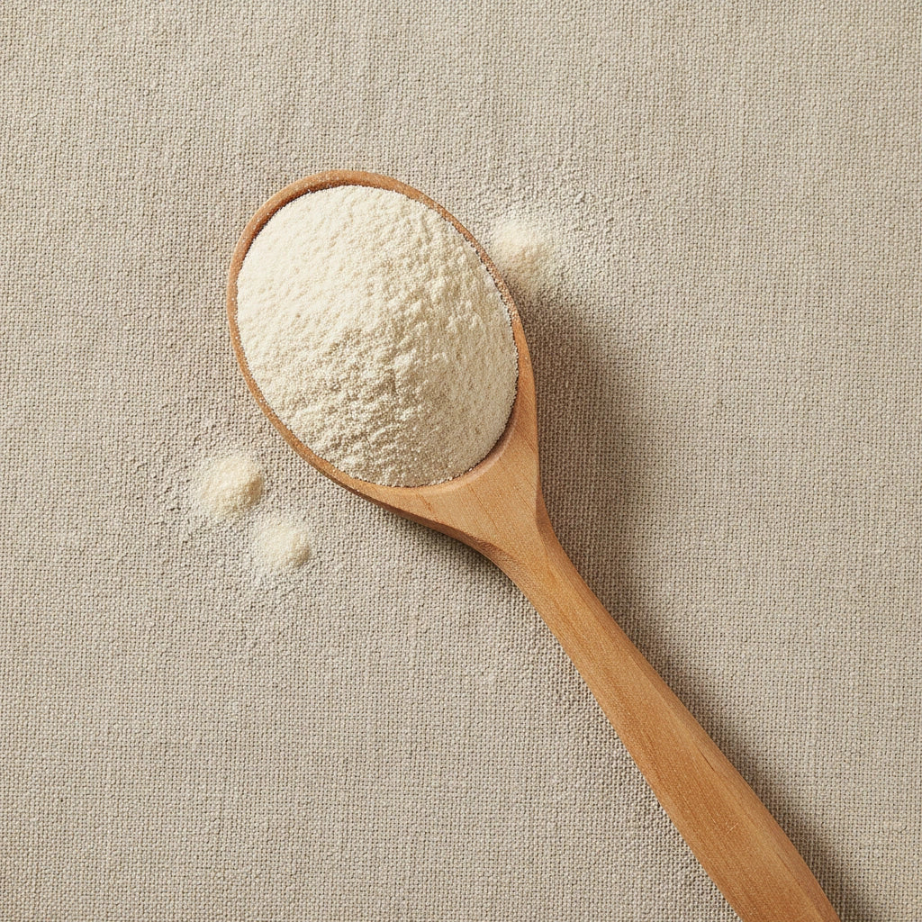 Apple Pectin Powder (Malus Spp.) | Create a luxurious, photorealistic product photograph featuring the original product naturally arranged in an elegant handcrafted wooden spoon on a soft, finely
