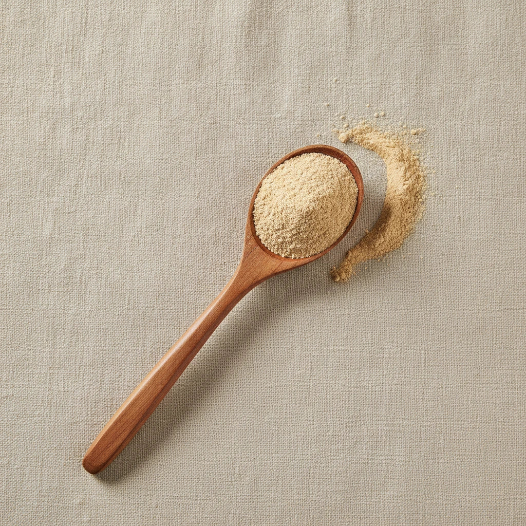 Astragalus Root Powder (Astragalus Membranaceus) | Create a luxurious, photorealistic product photograph featuring the original product naturally arranged in an elegant handcrafted wooden spoon on a soft, finely