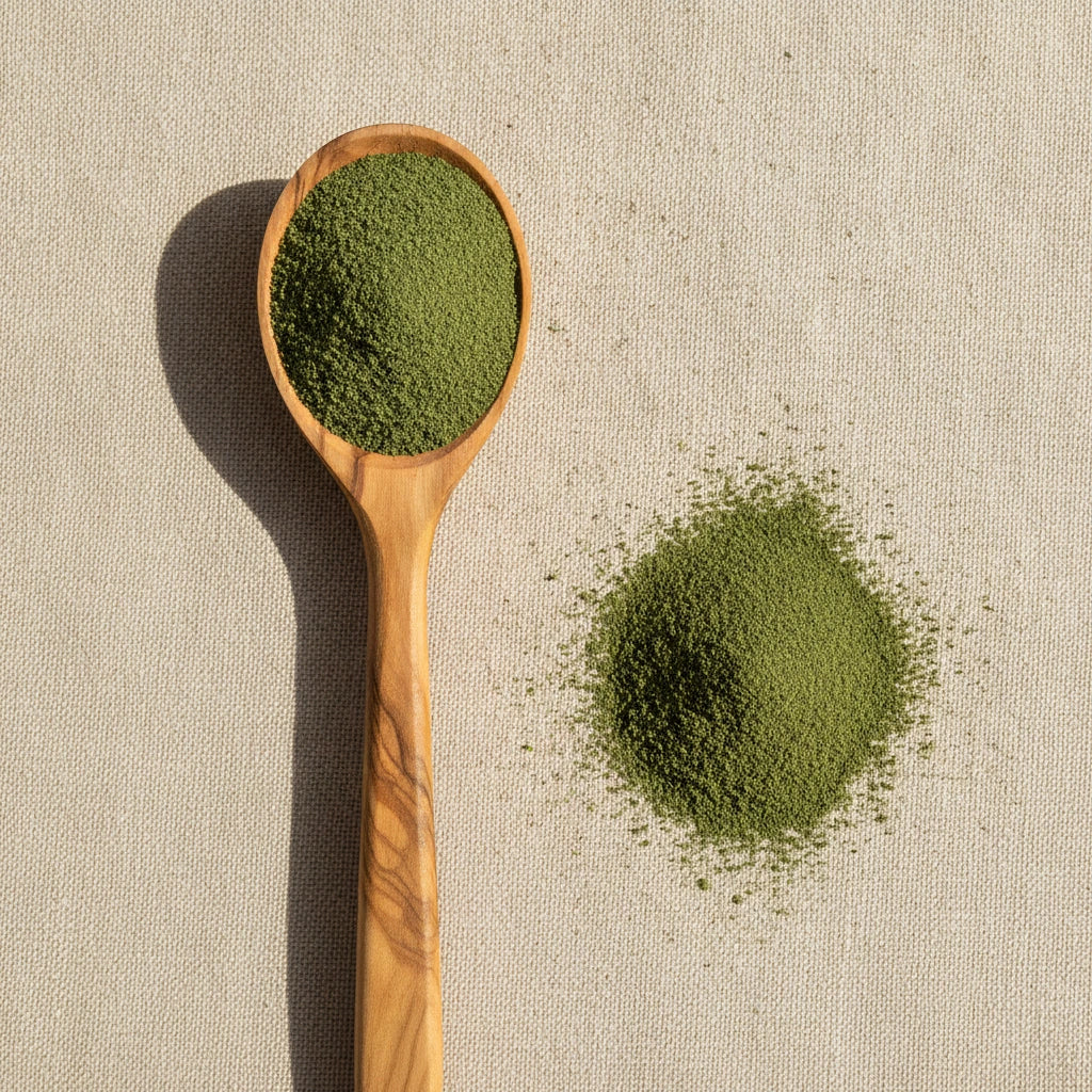 Cleavers Herb Powder (Galium Aparine) | Create a luxurious, photorealistic product photograph featuring the original product naturally arranged in an elegant handcrafted wooden spoon on a soft, finely