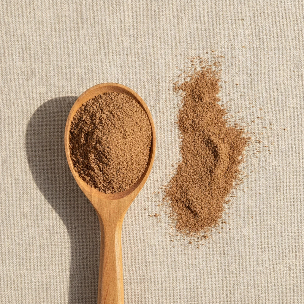 Cuachalalate Bark Powder (Amphipterygium Adstringens) | Create a luxurious, photorealistic product photograph featuring the original product naturally arranged in an elegant handcrafted wooden spoon on a soft, finely