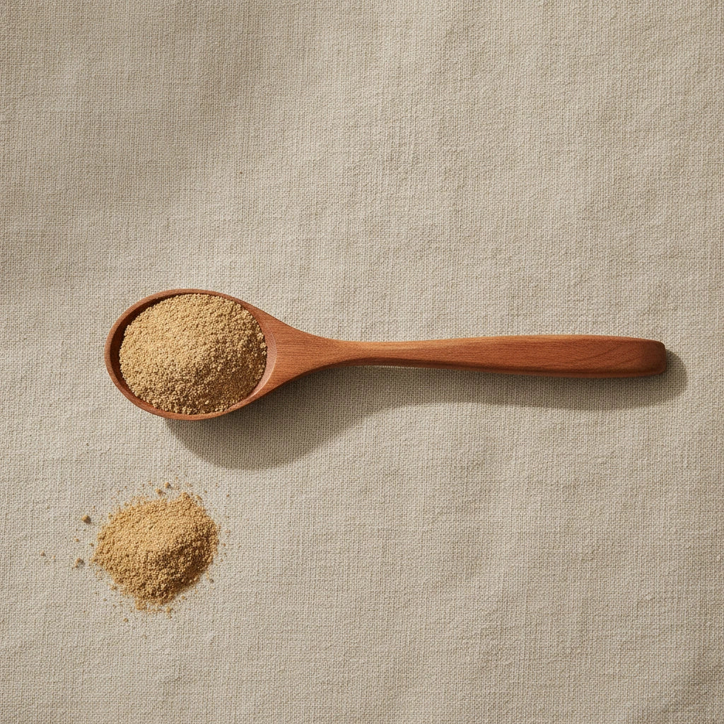 Dandelion Root Powder (Taraxacum Officinale) | Create a luxurious, photorealistic product photograph featuring the original product naturally arranged in an elegant handcrafted wooden spoon on a soft, finely