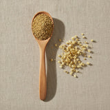Elder Flowers Whole (Sambucus Nigra) | Create a luxurious, photorealistic product photograph featuring the original product naturally arranged in an elegant handcrafted wooden spoon on a soft, finely