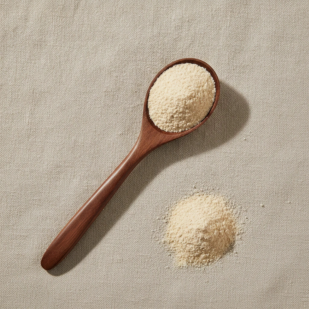 Frankincense Powder (Boswellia Carteri) | Create a luxurious, photorealistic product photograph featuring the original product naturally arranged in an elegant handcrafted wooden spoon on a soft, finely