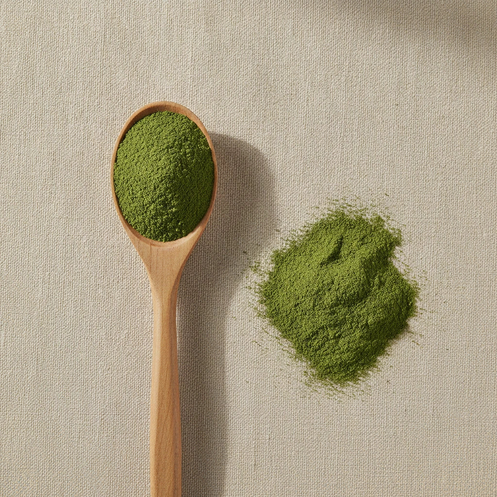 Ginkgo Leaf Powder (Ginkgo Biloba) | Create a luxurious, photorealistic product photograph featuring the original product naturally arranged in an elegant handcrafted wooden spoon on a soft, finely