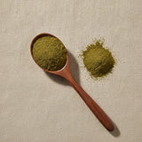 Goldenseal Herb Powder (Hydrastis Canadensis) | Create a luxurious, photorealistic product photograph featuring the original product naturally arranged in an elegant handcrafted wooden spoon on a soft, finely