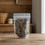 Hibiscus Zest Herbal Tea | The herb/powder/tea that is in the black bowl, i would like it to shown in a plastic stand up resalable bag that is clear.