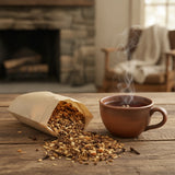 Licorice Spice Herbal Tea | Can you show this tea outside of the bag and bowl, on a table next to a hot tea cup in a rustic home.