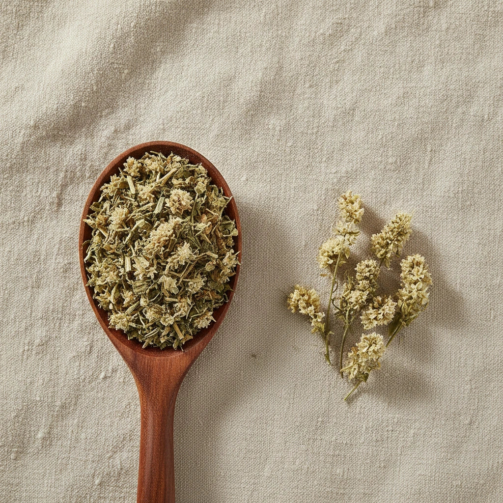 Mullein Flowers Whole (Gnaphalium Spp.) | Create a luxurious, photorealistic product photograph featuring the original product naturally arranged in an elegant handcrafted wooden spoon on a soft, finely