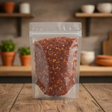 Red Chili Pepper Flakes (35,000 HU) (Capsicum Annuum) | The herb/berry/powder/fruit/root/bark that is in the black bowl, i would like it to shown in a plastic stand up resalable pouch that is clear.