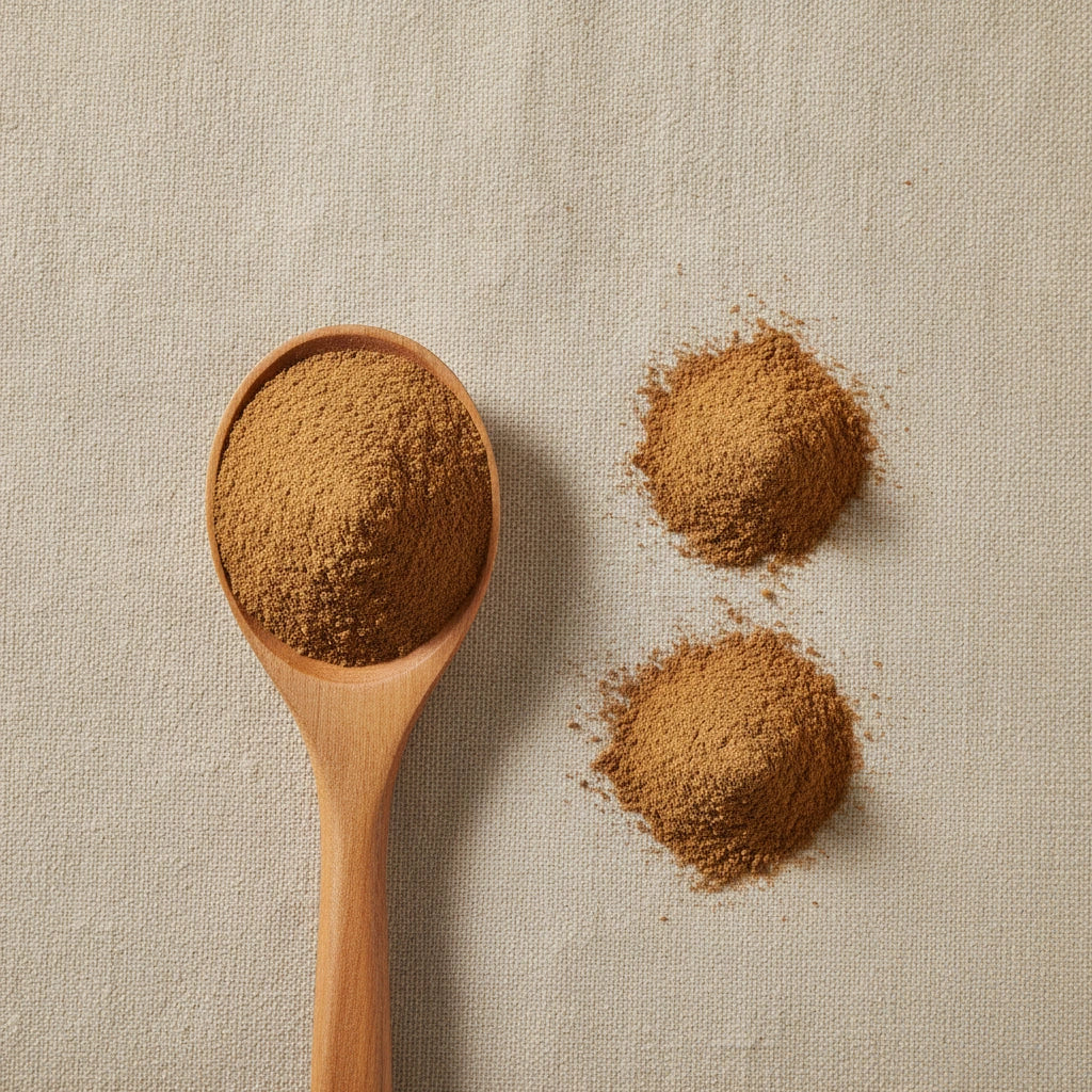 Tongkat Ali Powder (Eurycoma Longifolia Jack) | Create a luxurious, photorealistic product photograph featuring the original product naturally arranged in an elegant handcrafted wooden spoon on a soft, finely