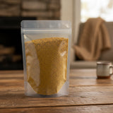 Turmeric Golden Chai Tea | The herb/berry/powder/fruit/root/bark that is in the black bowl, i would like it to shown in a plastic stand up resalable pouch that is clear.