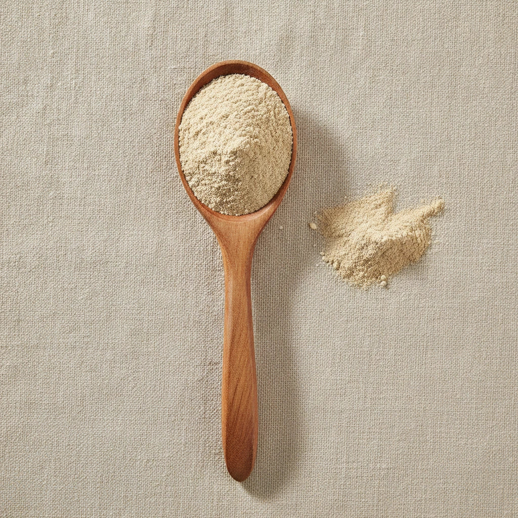 Wereke Root Powder (Ibervillea Sonorae) | Create a luxurious, photorealistic product photograph featuring the original product naturally arranged in an elegant handcrafted wooden spoon on a soft, finely